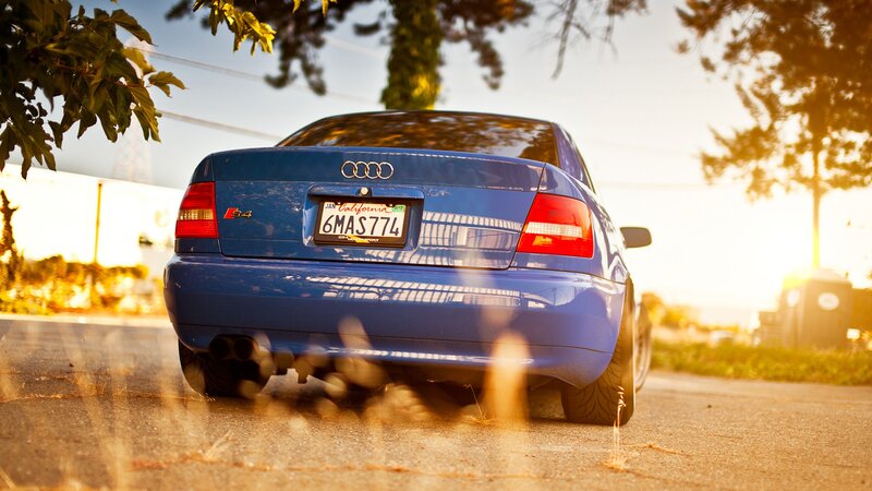 blue audi s4 at sunset