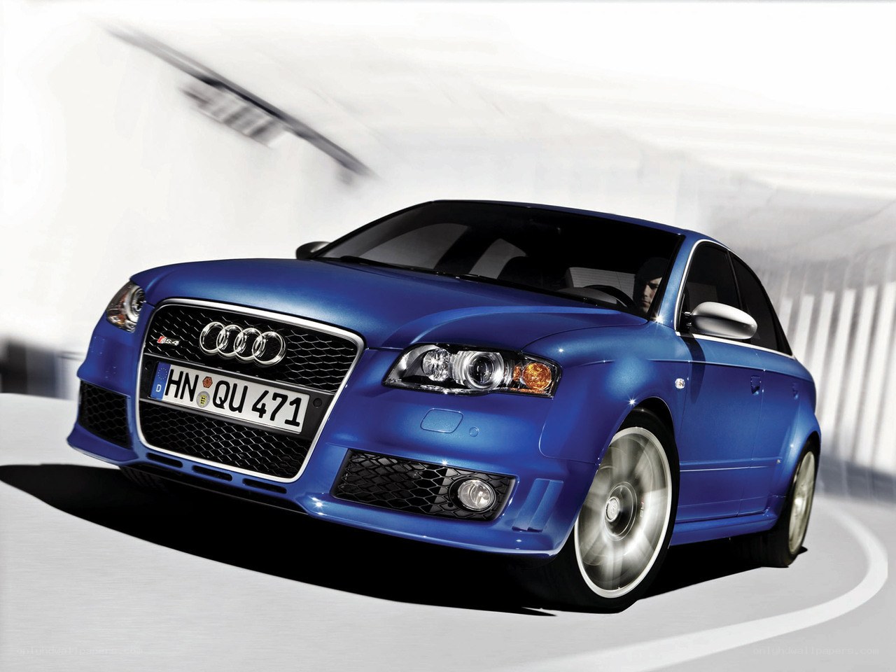 blue audi s4 in motion