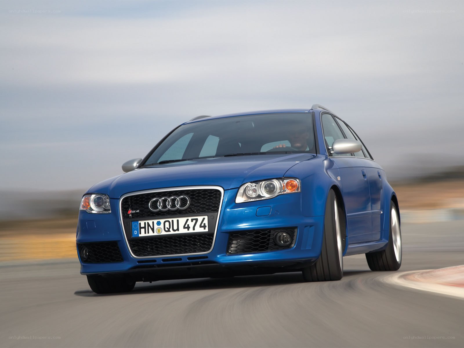 blue audi s4 on a racetrack