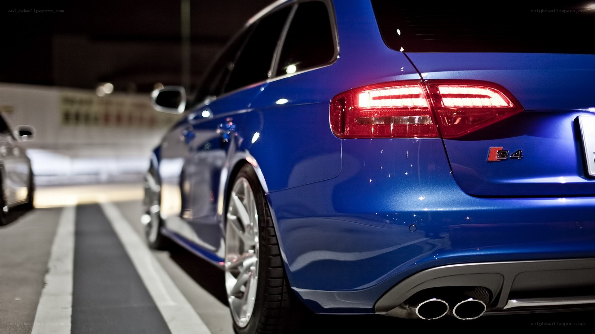 blue audi s4 rear view