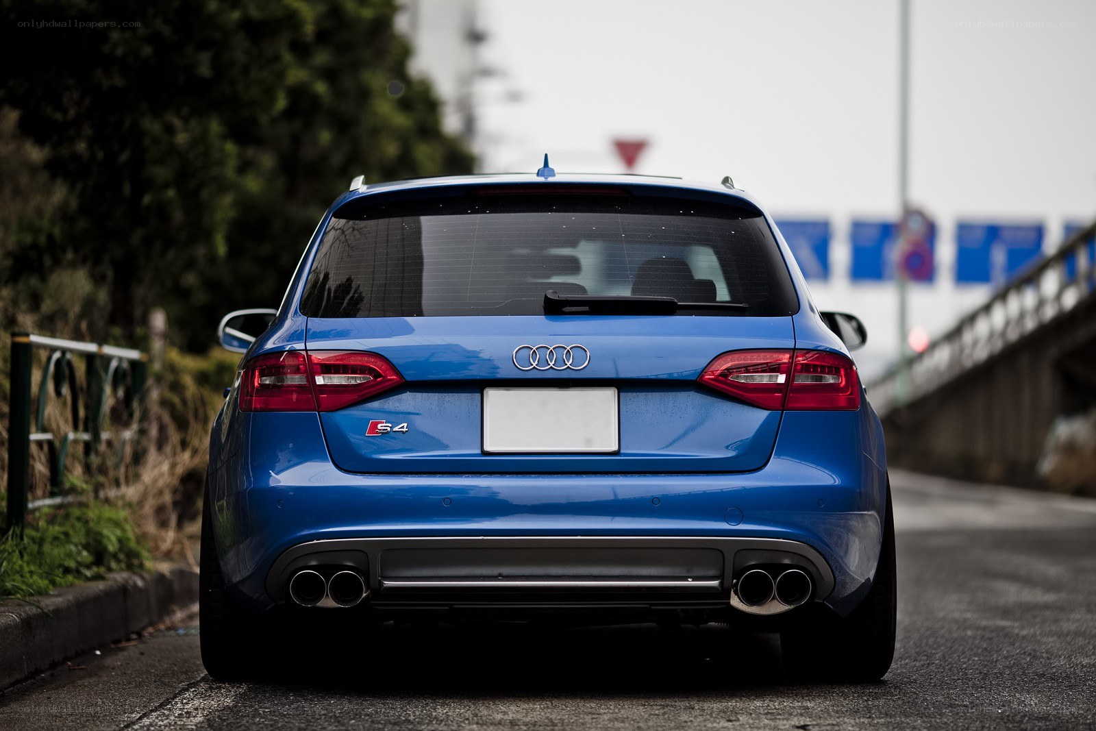 blue audi s4 rear view