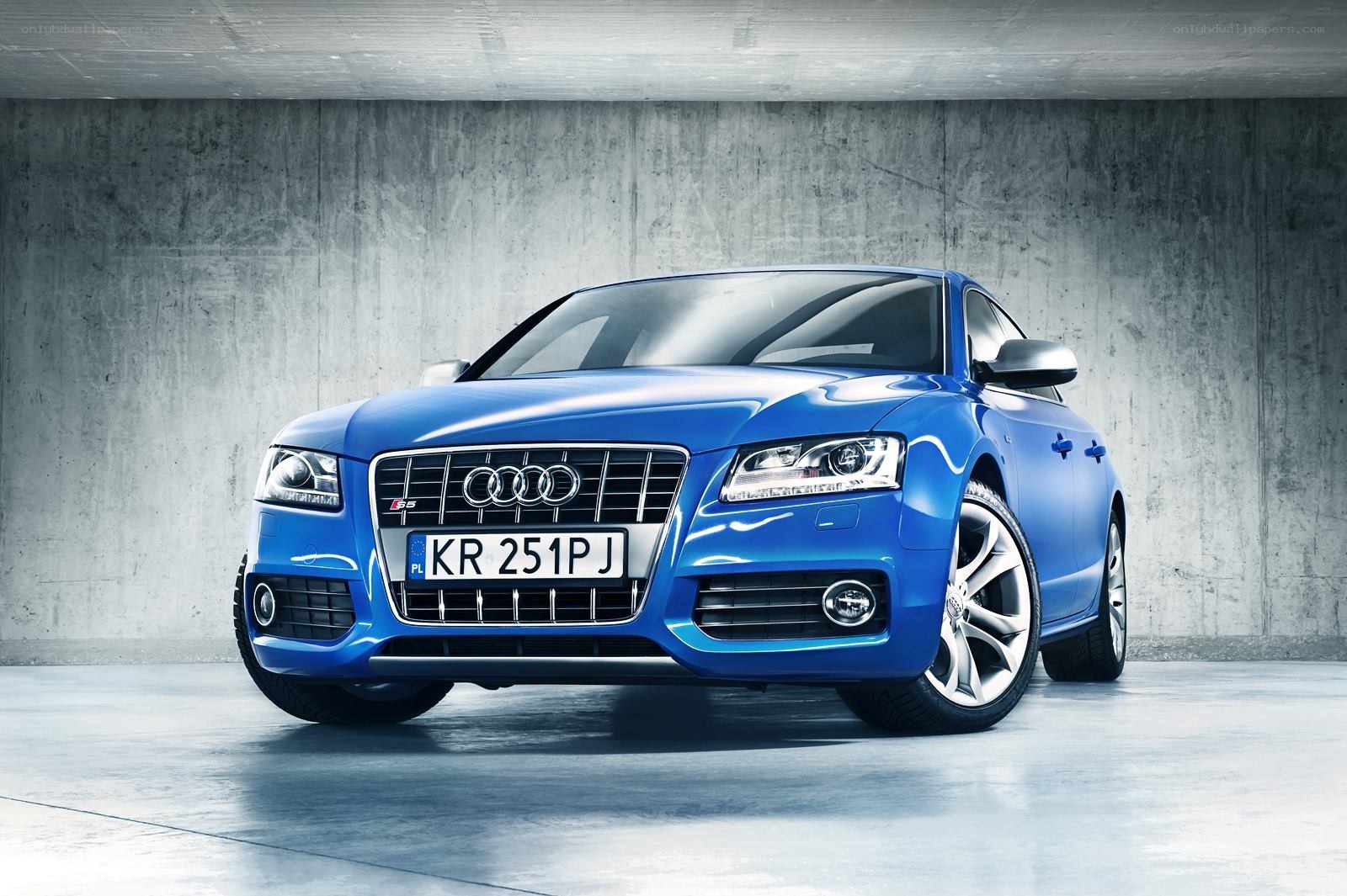 Blue Audi S5 in a garage