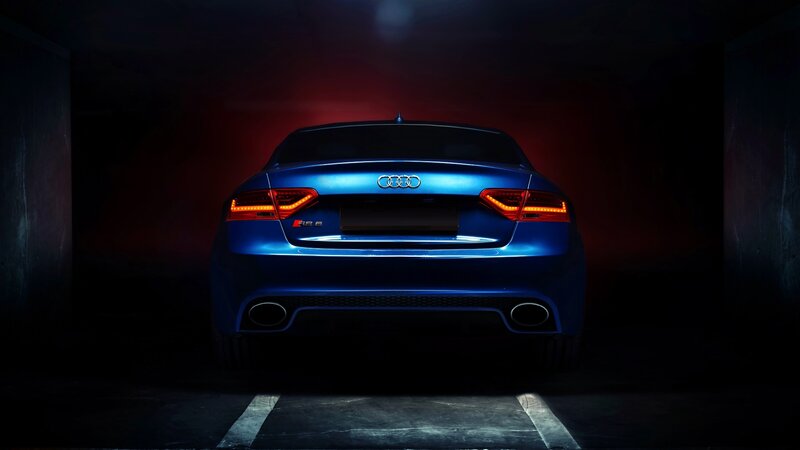 blue audi s5 rear view