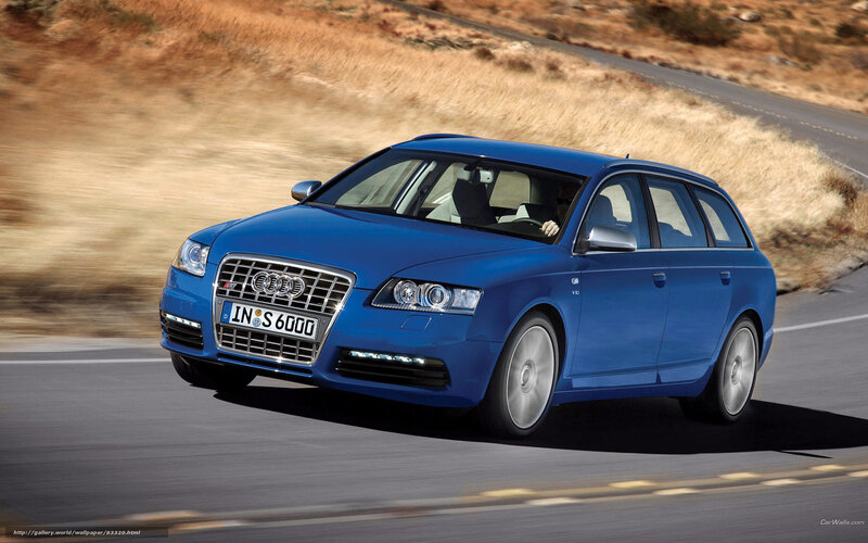 Blue Audi S6 Avant in motion