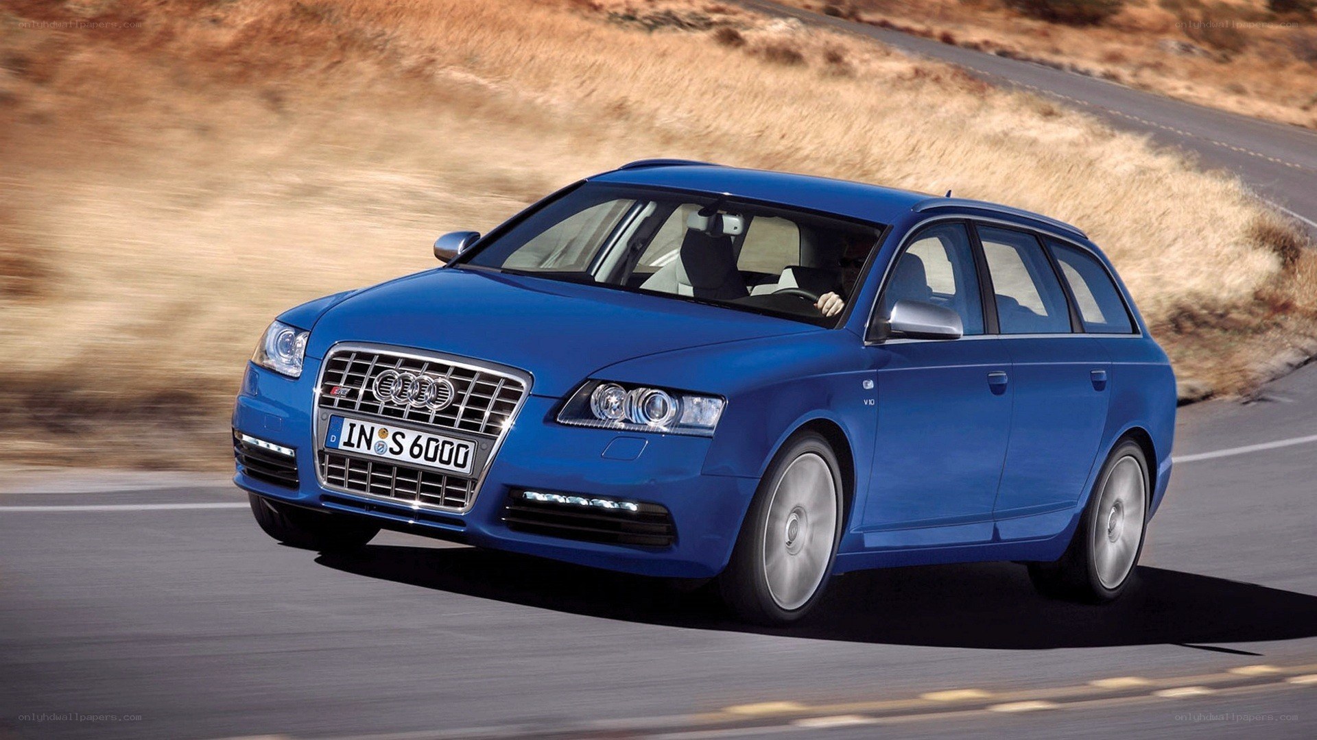 blue audi s6 on a road