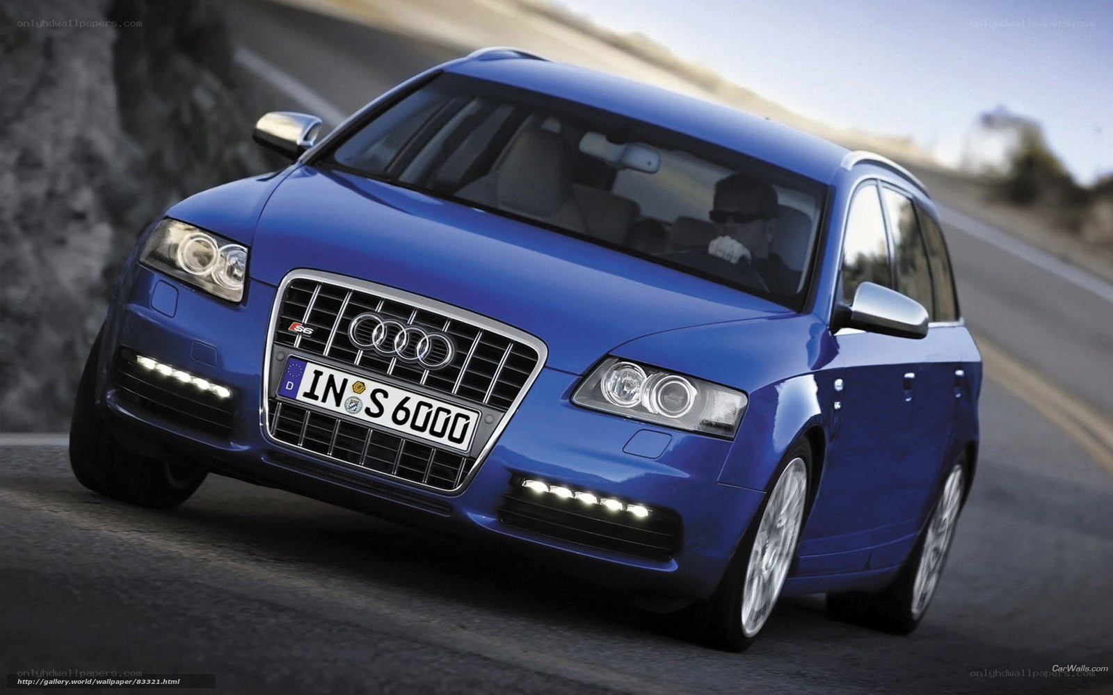 Blue Audi S6 on winding road
