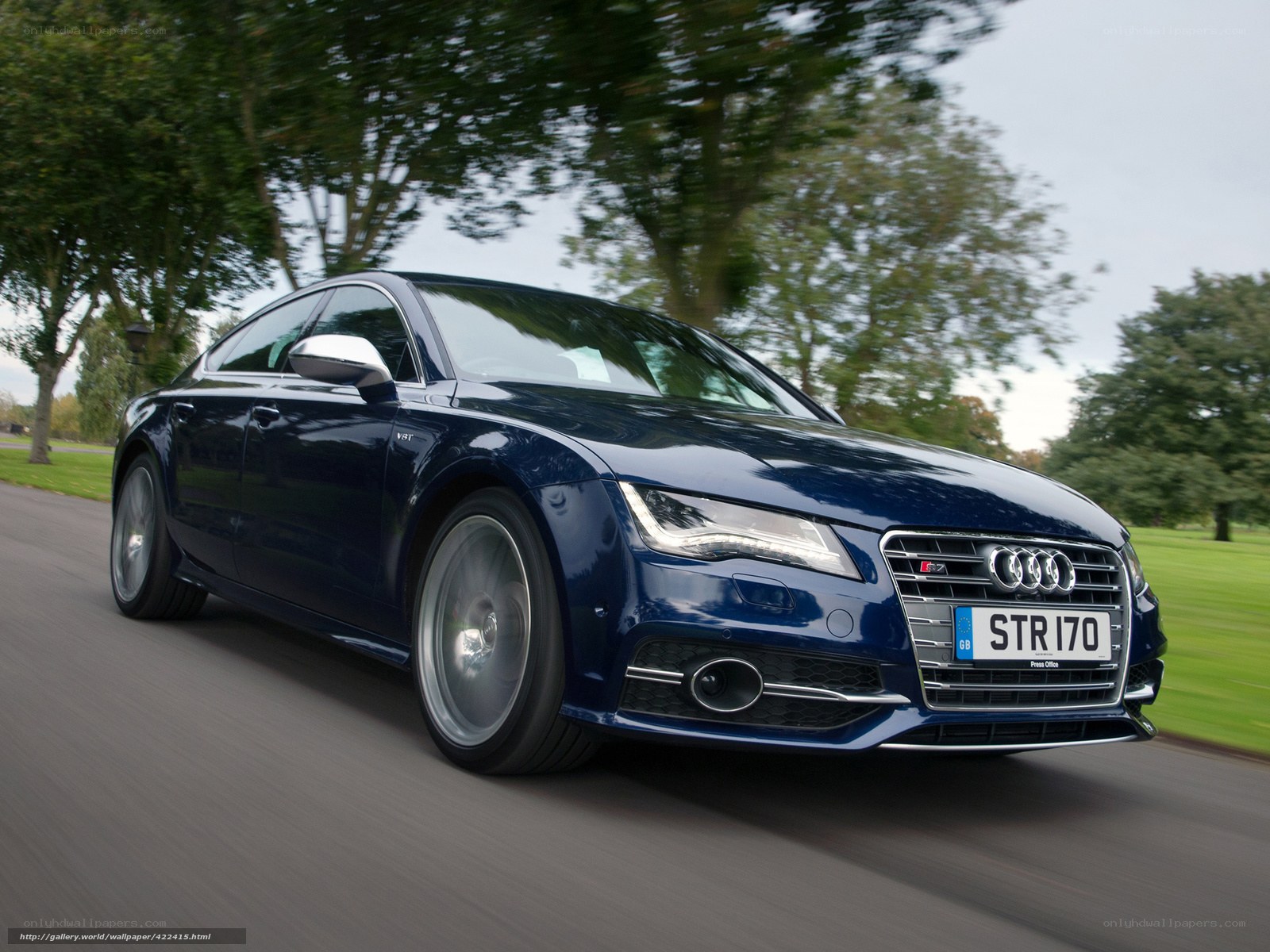 Blue Audi S7 in motion