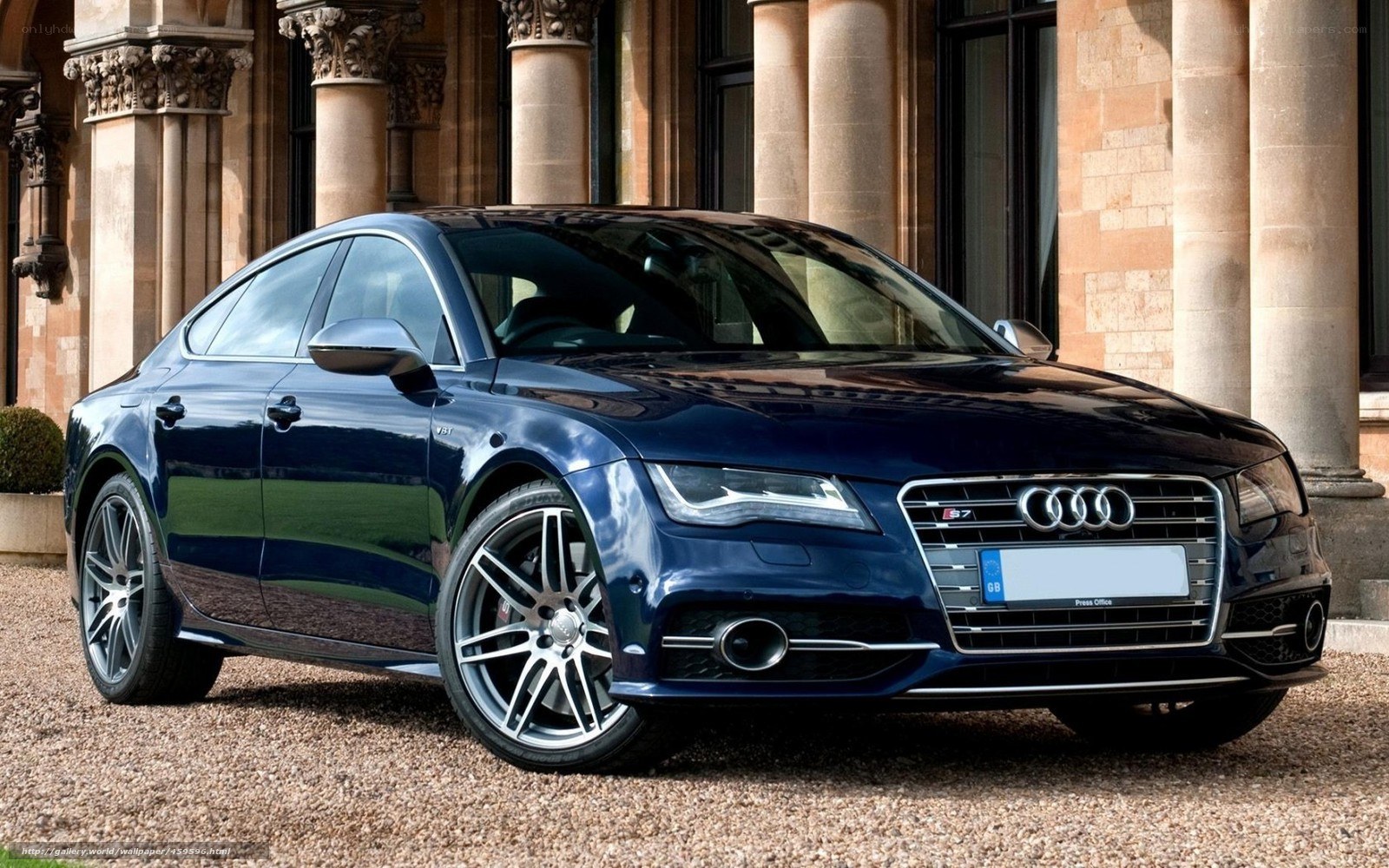 Blue Audi S7 parked outside