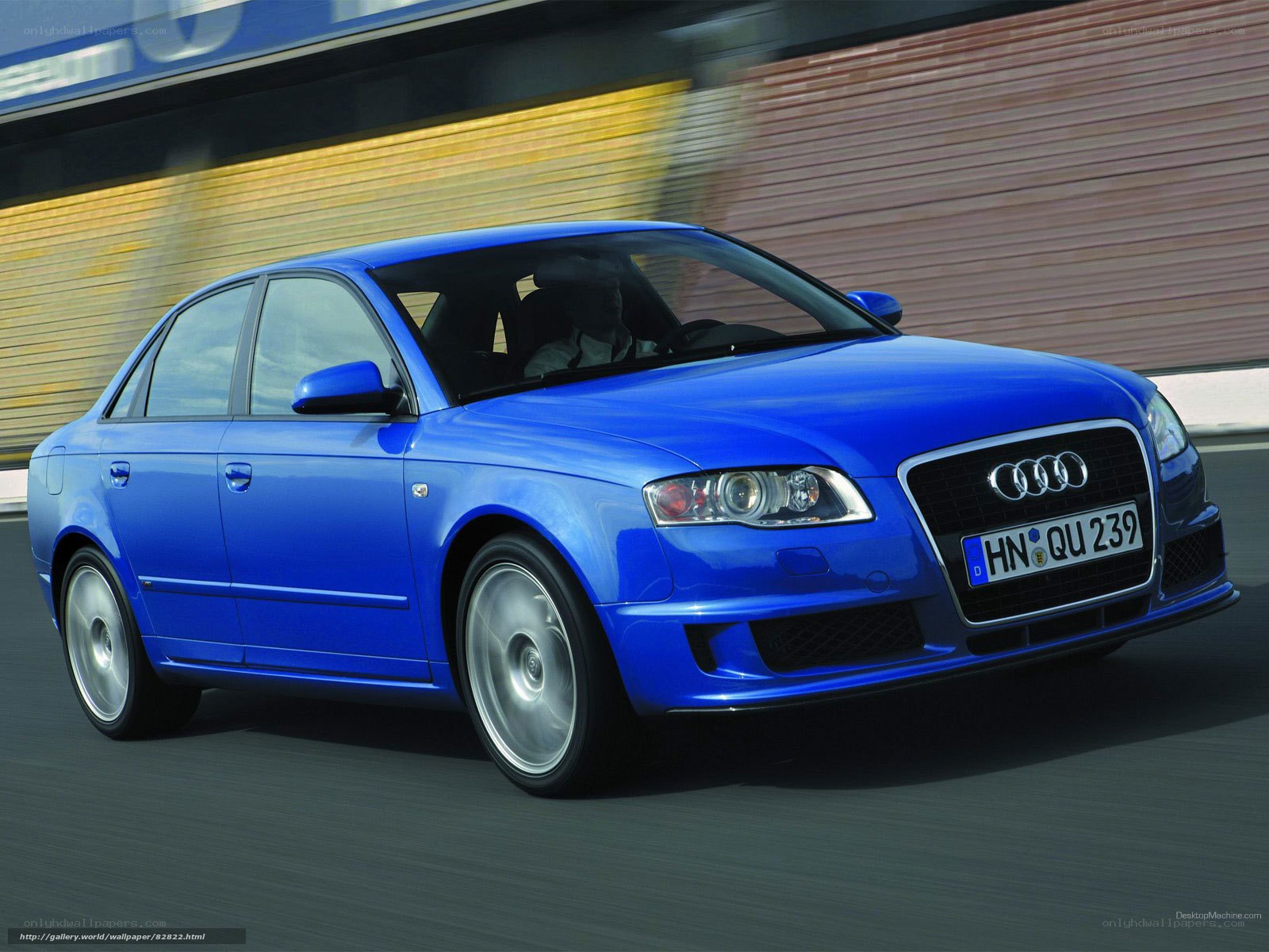 blue audi sedan in motion