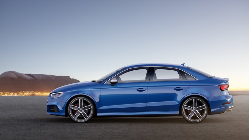 Blue Audi Sedan — Serene, Sunset