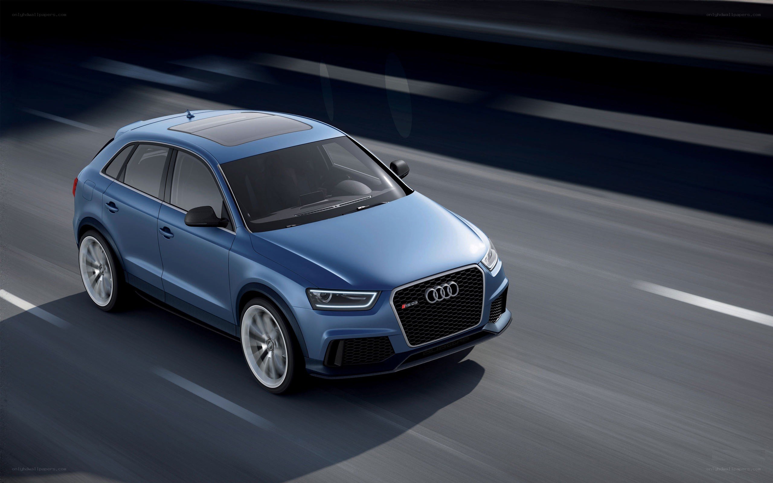Blue Audi SQ3 in motion