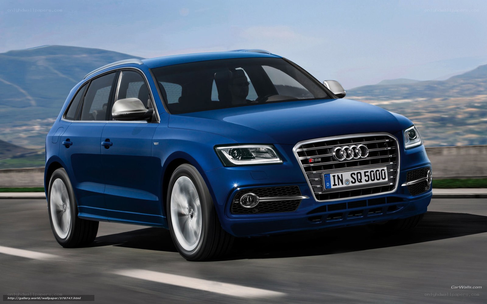 Blue Audi SQ5 in motion