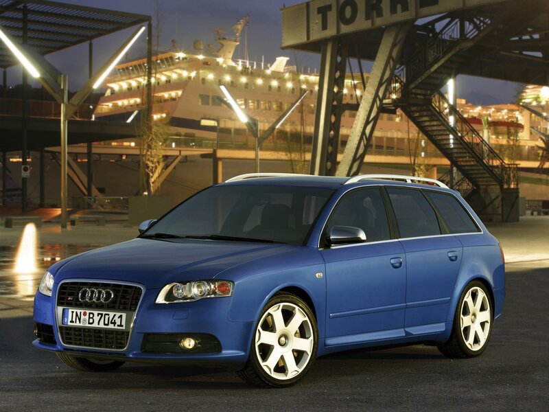 Blue Audi station wagon at night