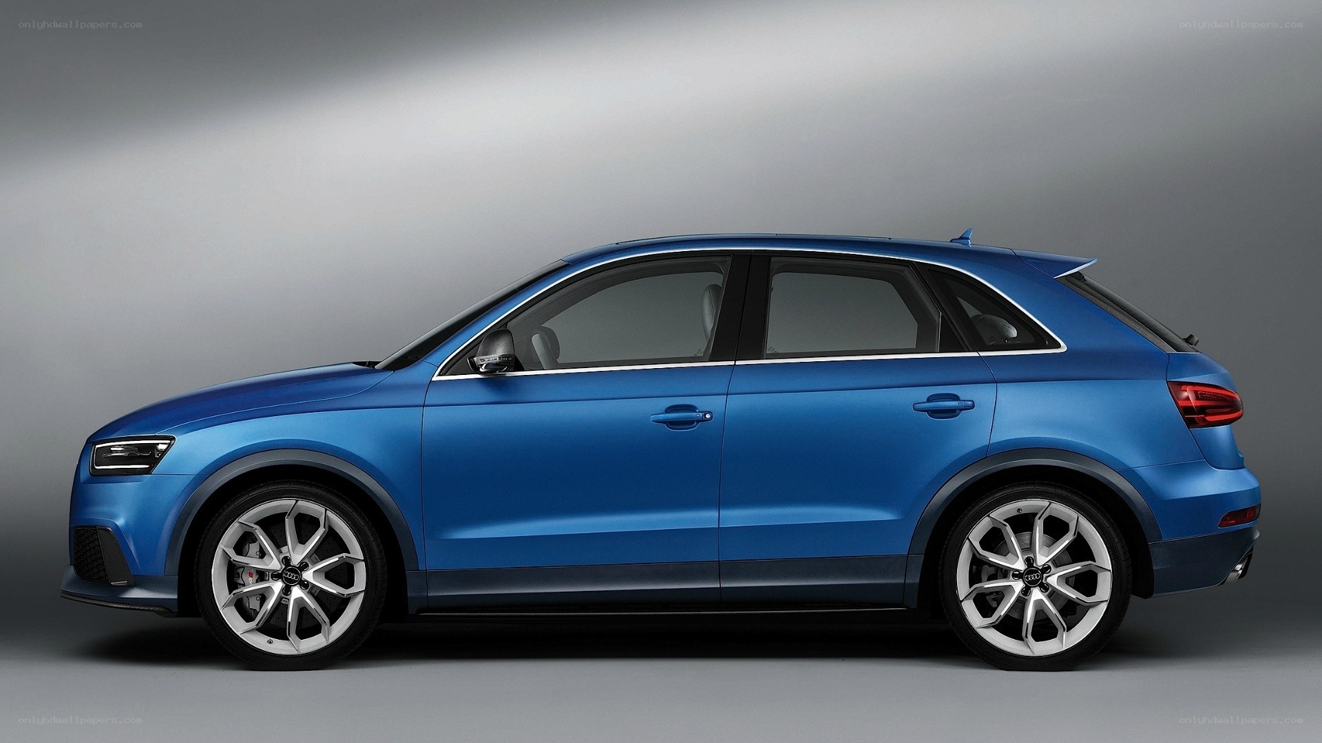 blue audi suv side view