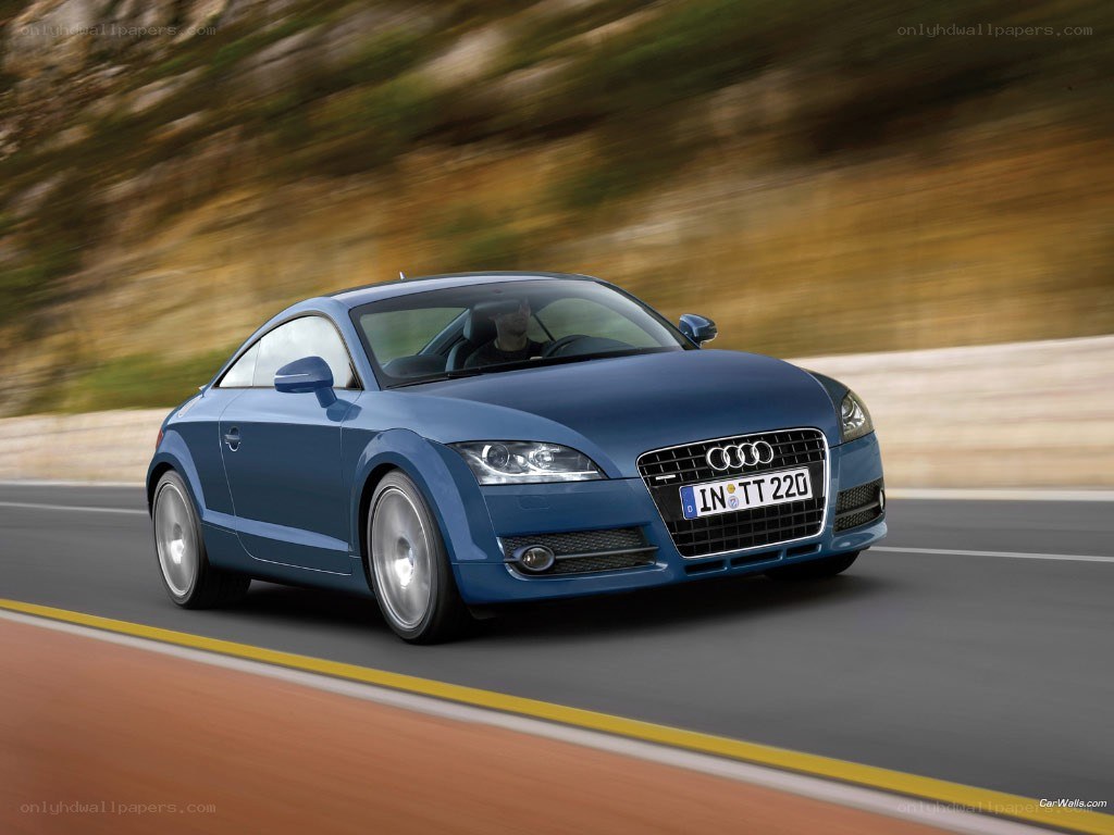 Blue Audi TT in motion