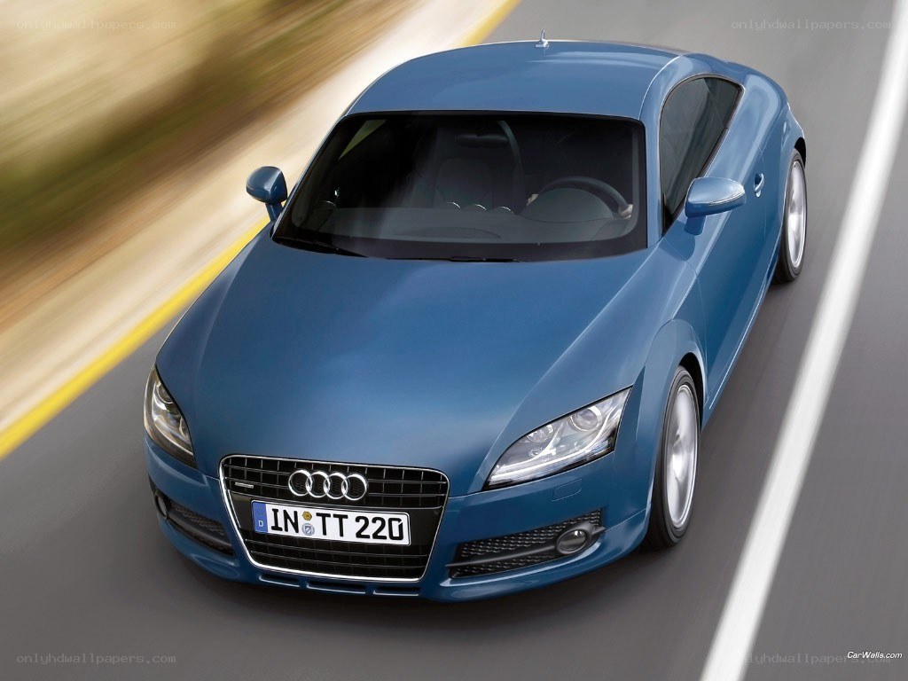 blue audi tt in motion