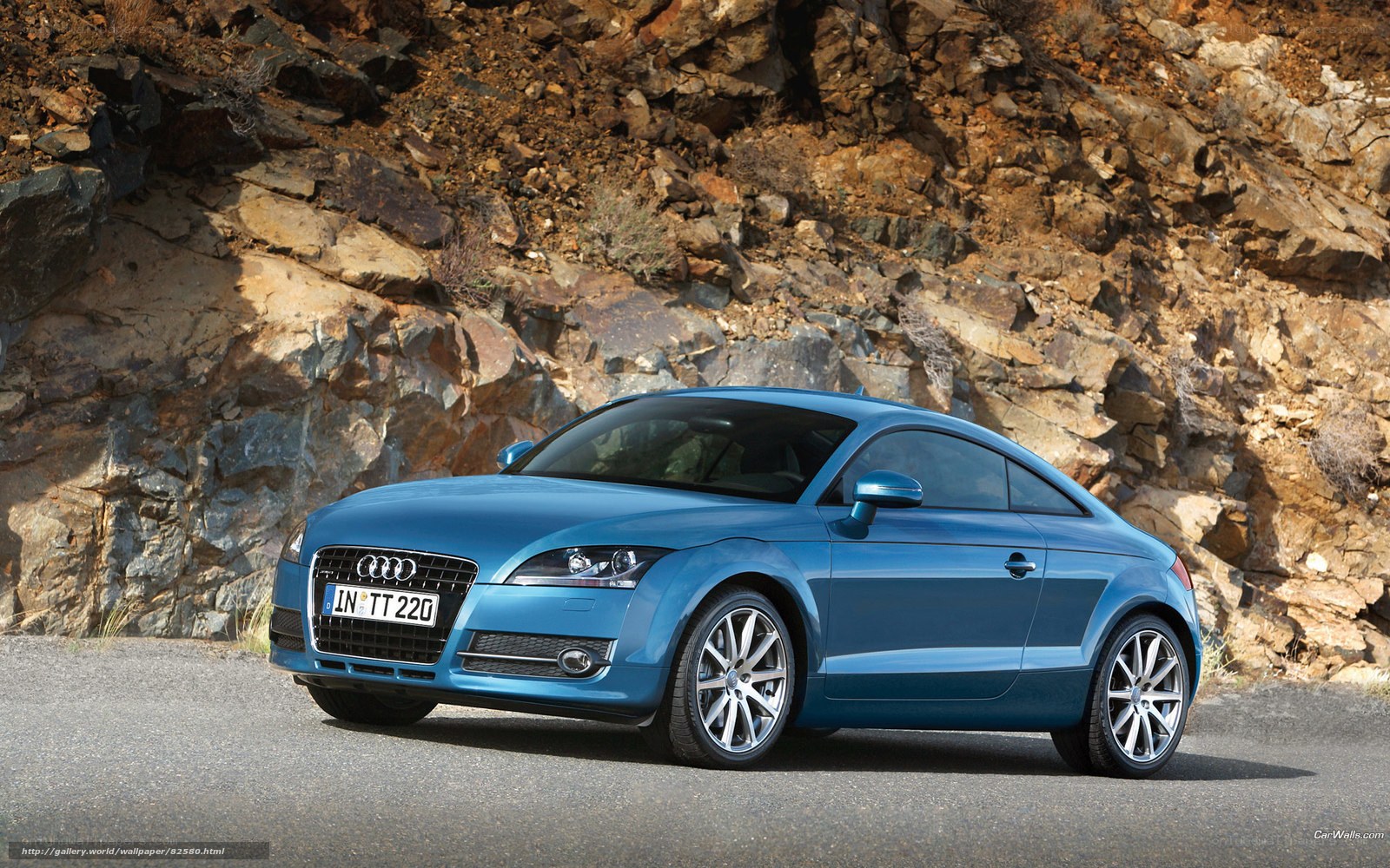 Blue Audi TT on a mountain road