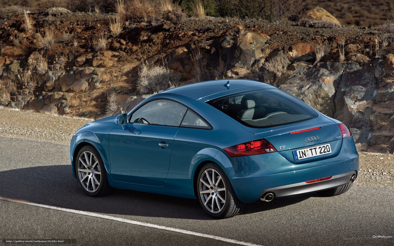 Blue Audi TT on a road