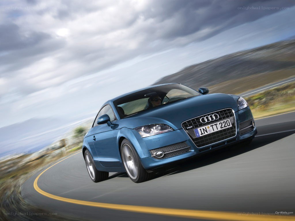 Blue Audi TT on winding road