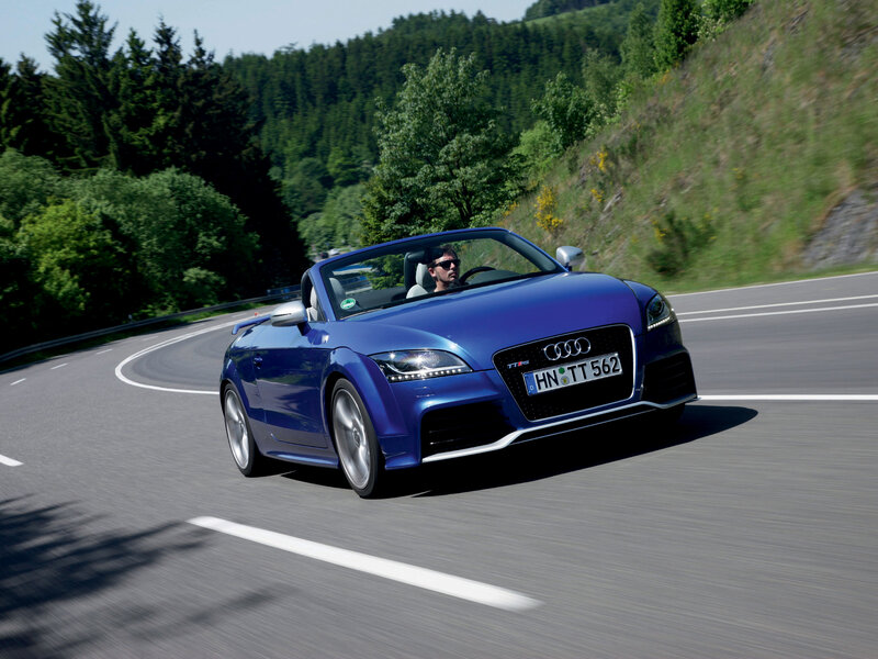 Blue Audi TT RS convertible on road