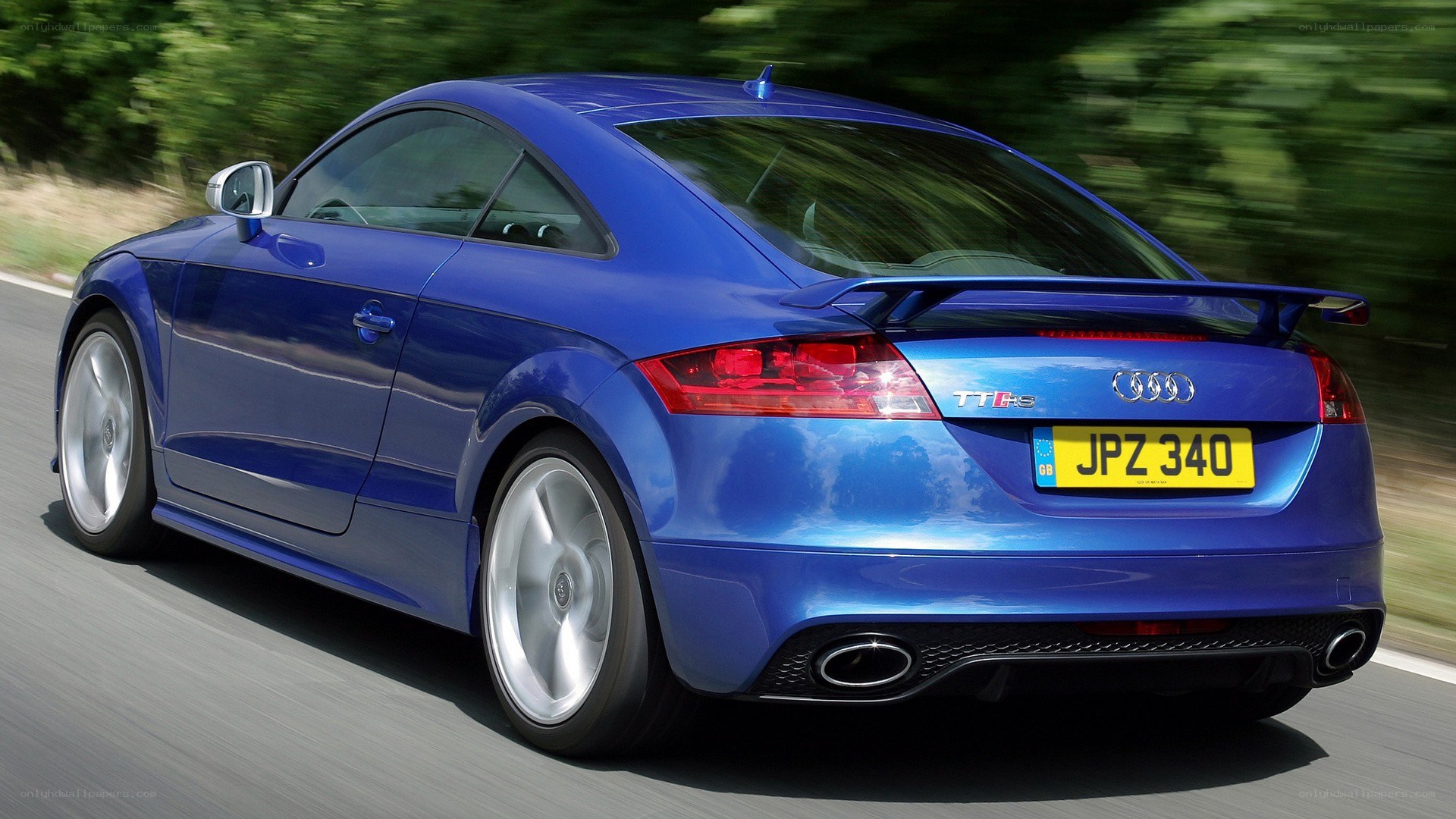 blue audi tt rs in motion