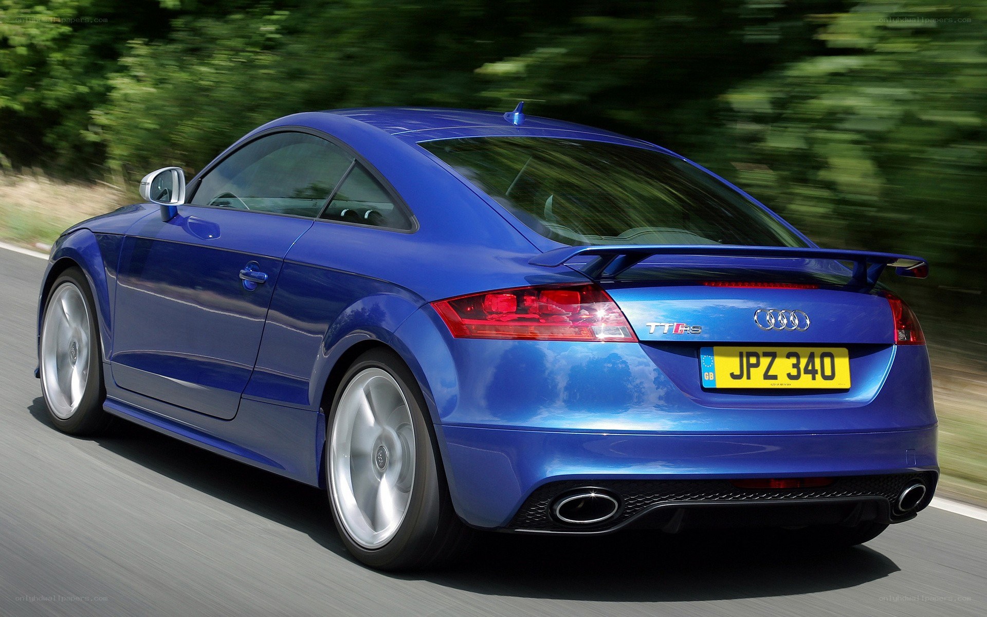 blue audi tt rs in motion