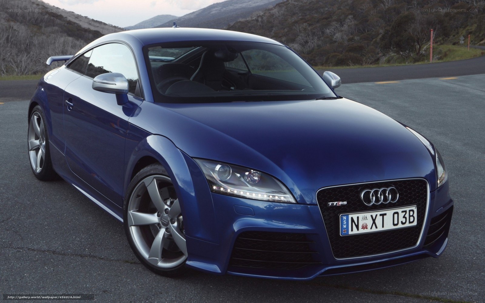 Blue Audi TT RS on a road