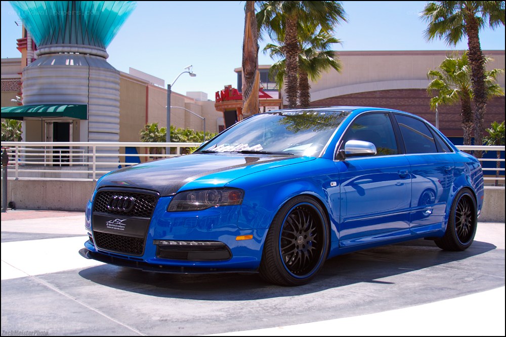 blue audi with carbon hood