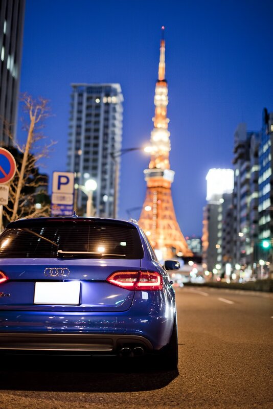 Blue Audi with Tokyo Tower at night