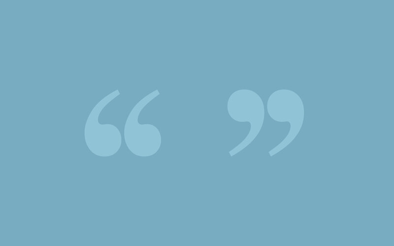 blue background with quotation marks
