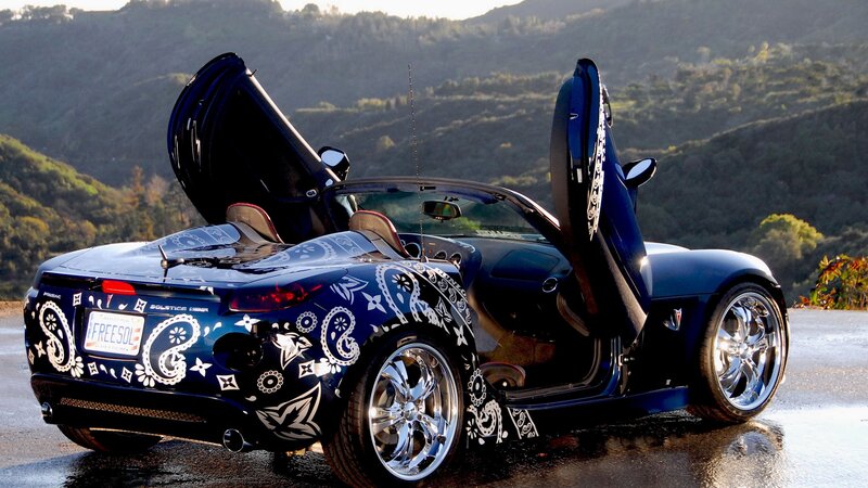 blue bandana car on hillside