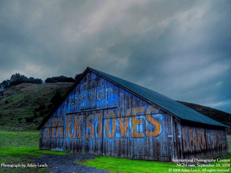 Blue barn with weathered sign
