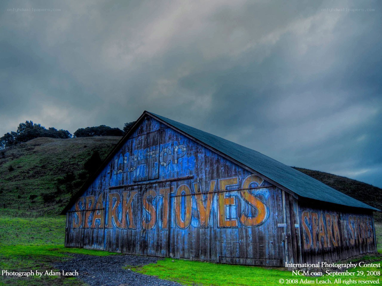Blue barn with weathered sign