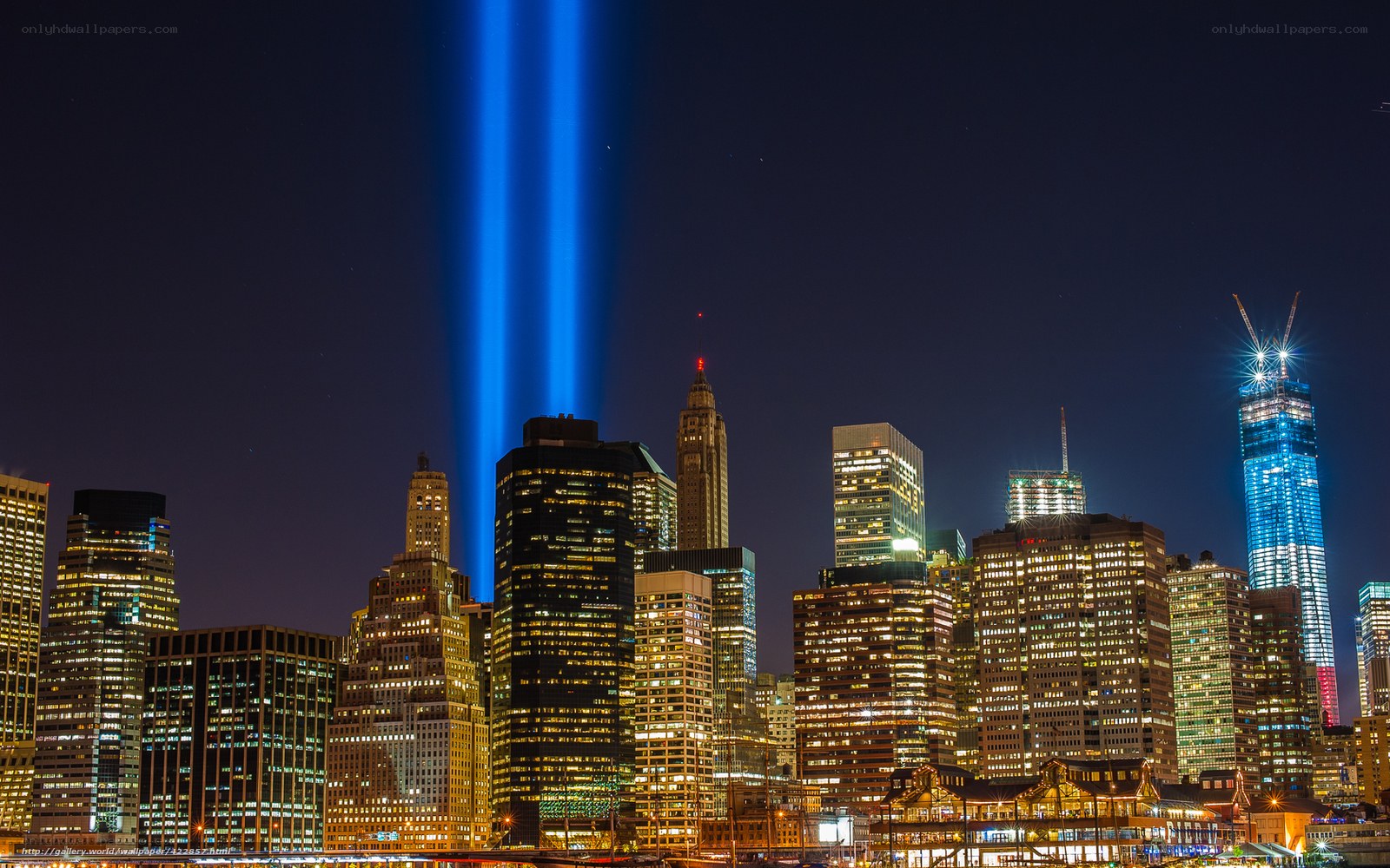 Blue beams over NYC skyline