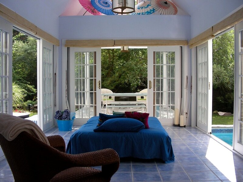 Blue Bed in Sunroom