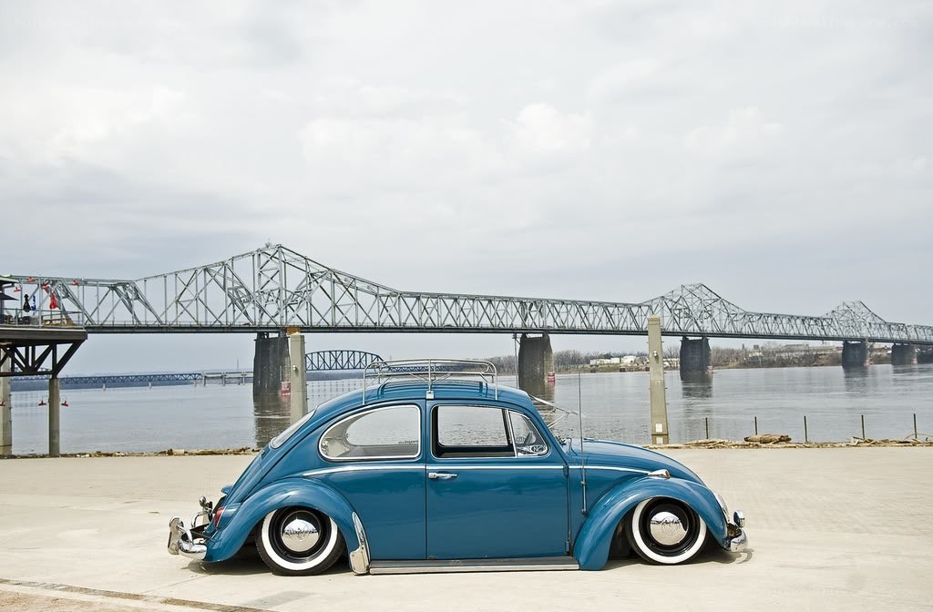 Blue Beetle car by a river