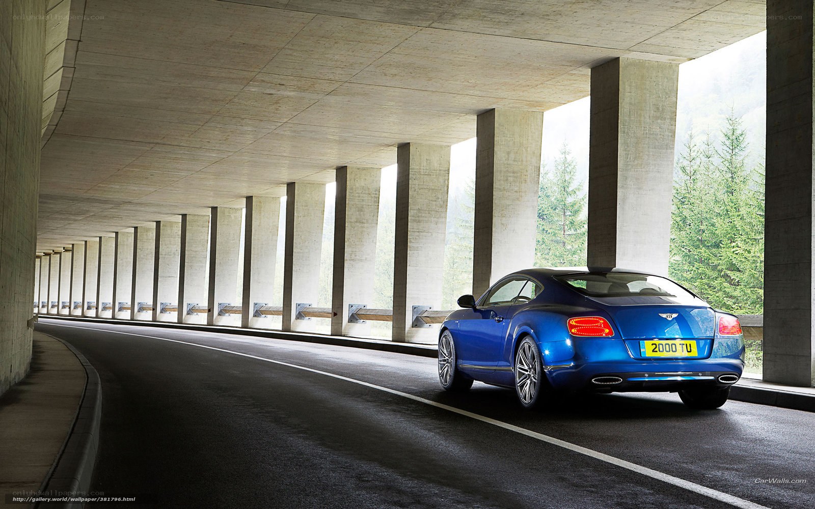 Blue Bentley in a tunnel