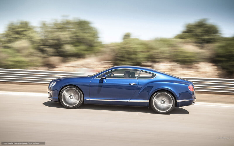 blue bentley in motion