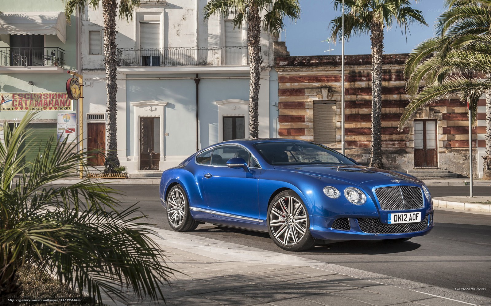 Blue Bentley on a sunny street