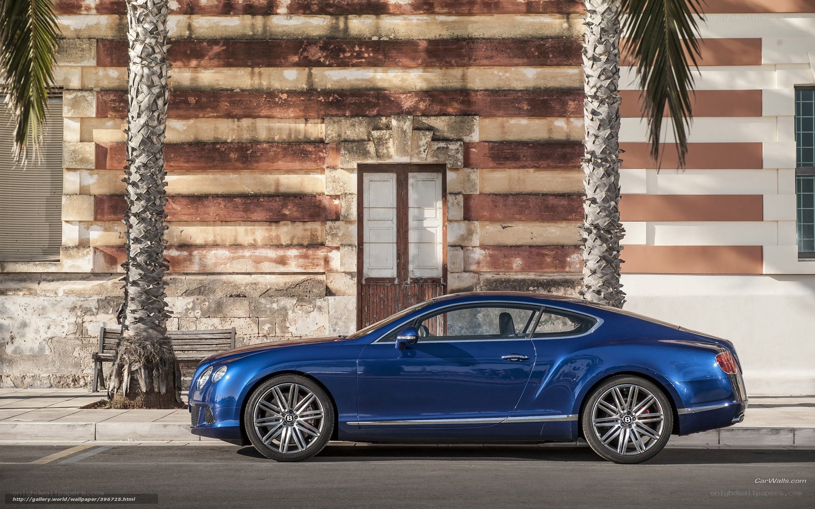 Blue Bentley parked on street
