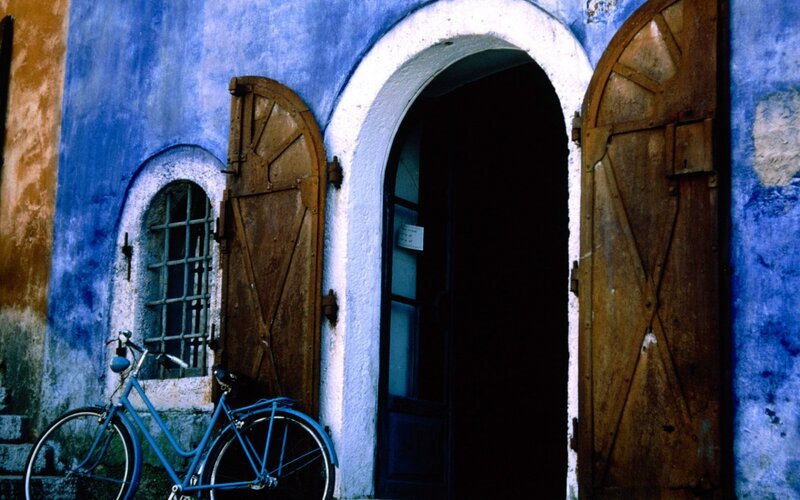 Blue Bicycle by Door