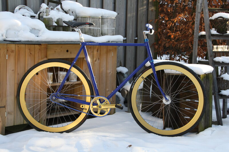 blue bicycle in snow