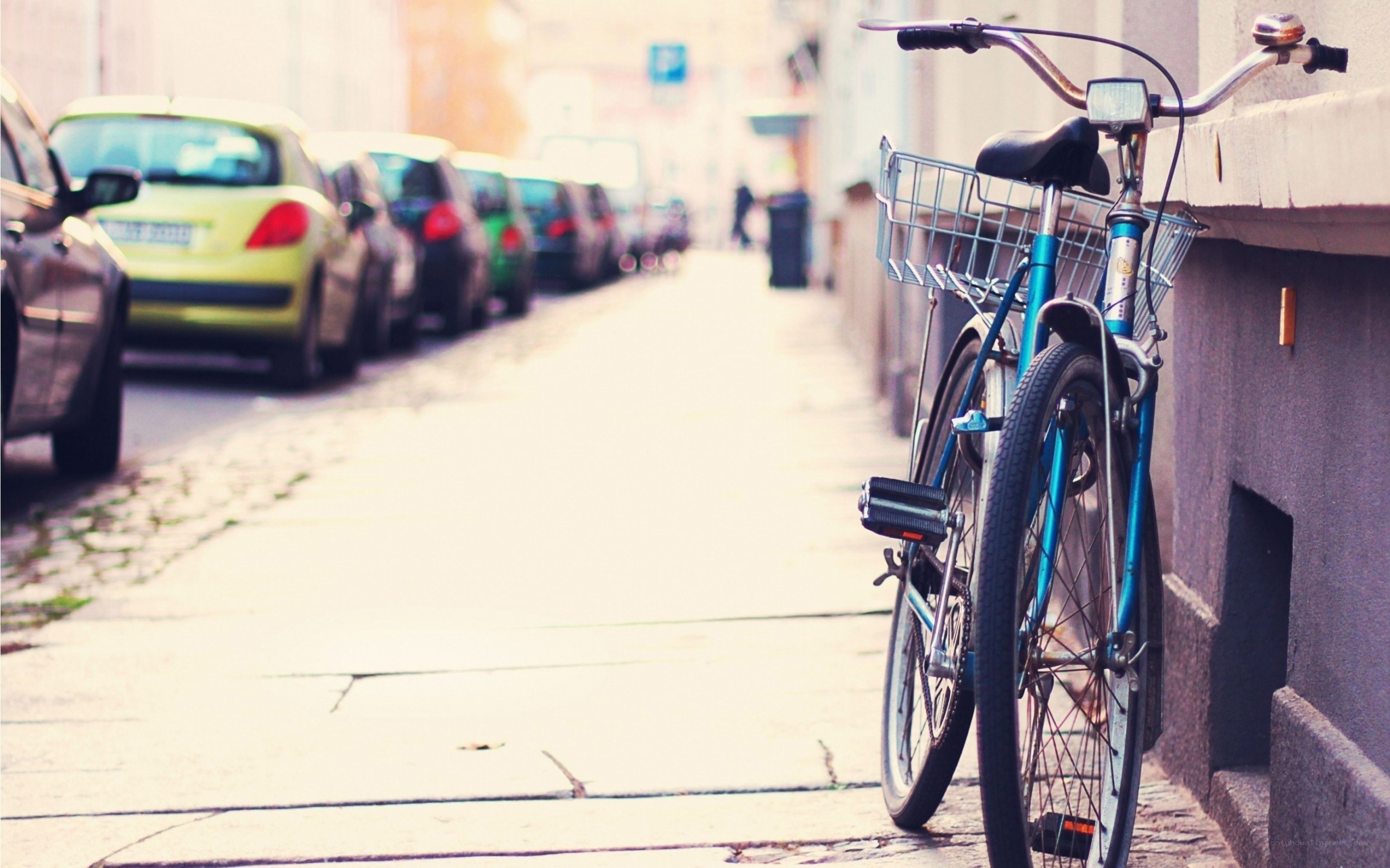Blue bicycle on city sidewalk