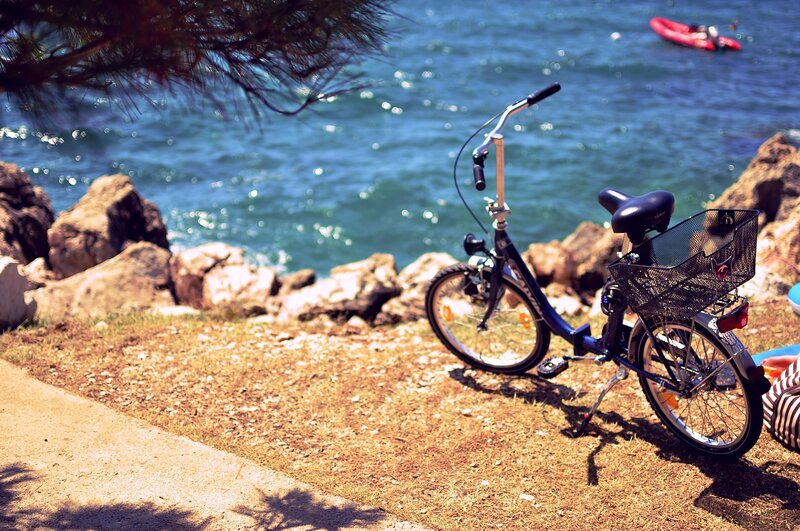 Blue Bicycle on Shore