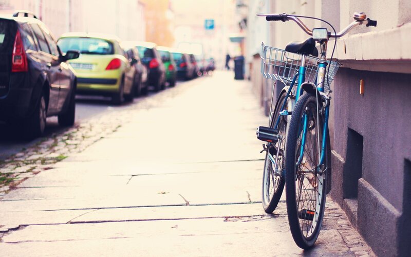 Blue Bicycle on Sidewalk — Calm