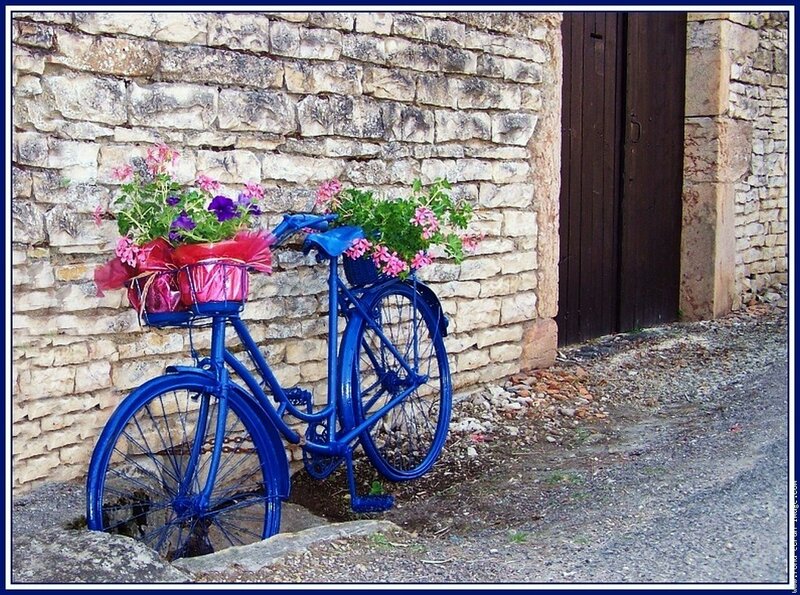 Blue bicycle with flowers
