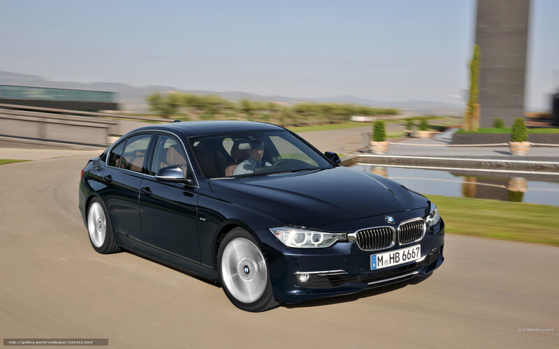 Blue BMW 3 Series in motion