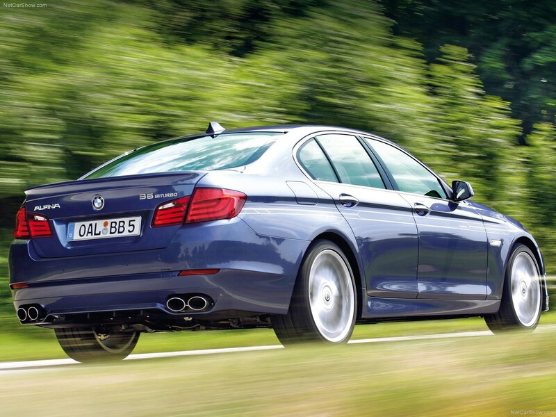 blue bmw alpina b5 biturbo in motion