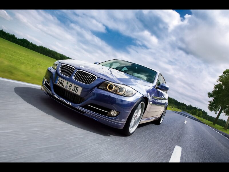 blue bmw alpina on country road
