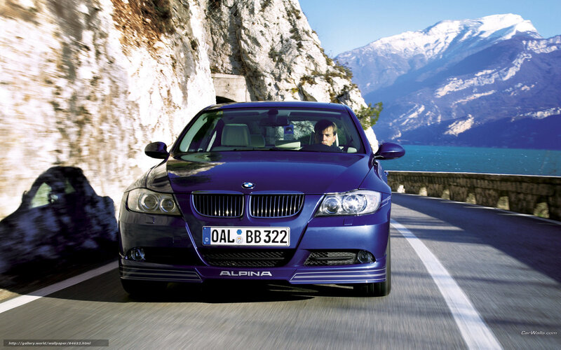 Blue BMW Alpina on mountain road